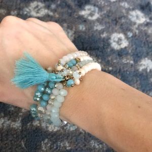 Like new beaded bracelet with tassel